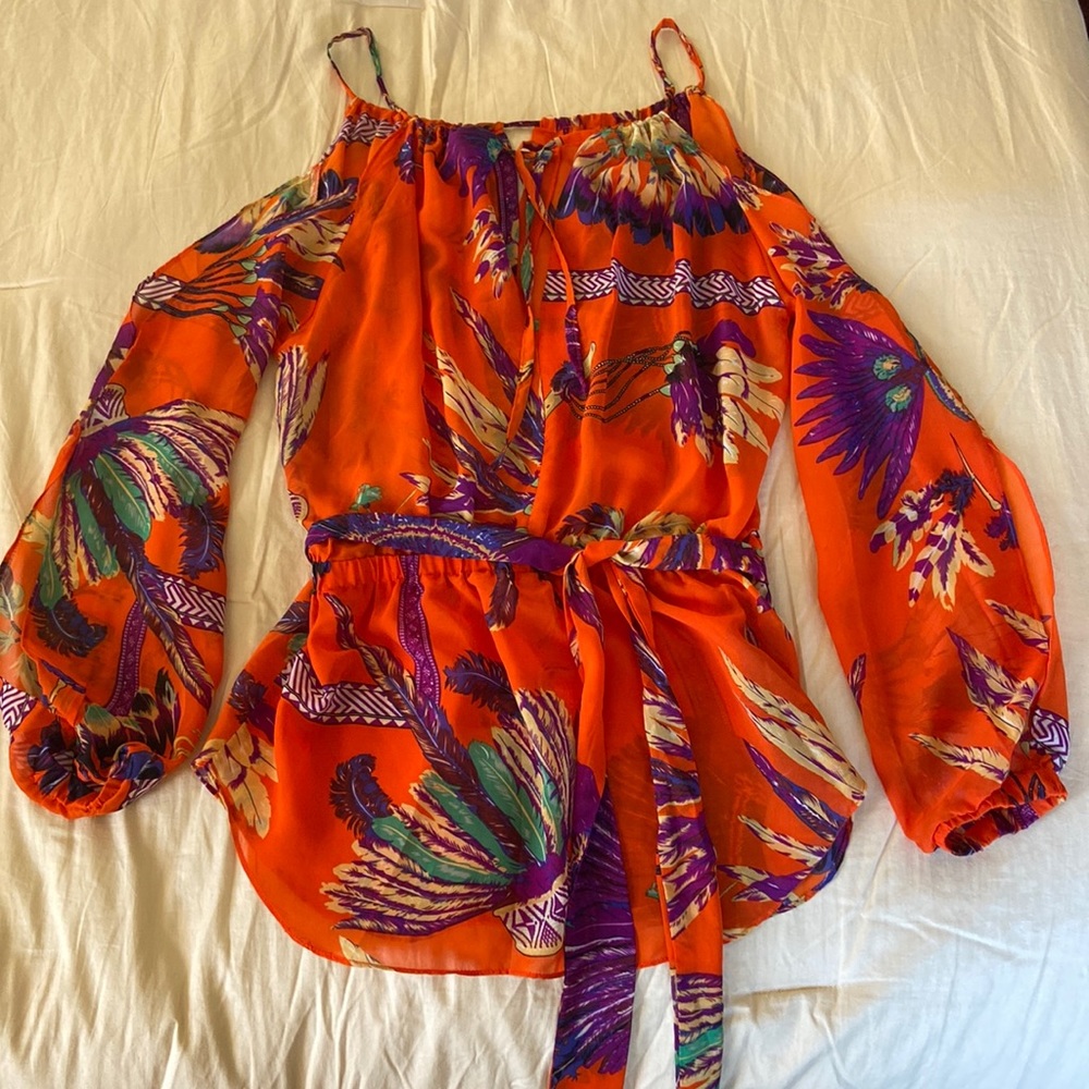 A beautiful multi colored blouse perfect for a breezy summer day!
